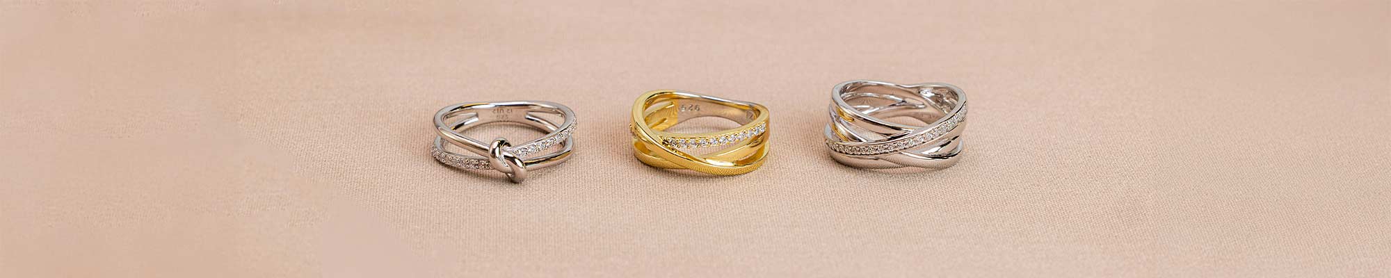 Cross over ring