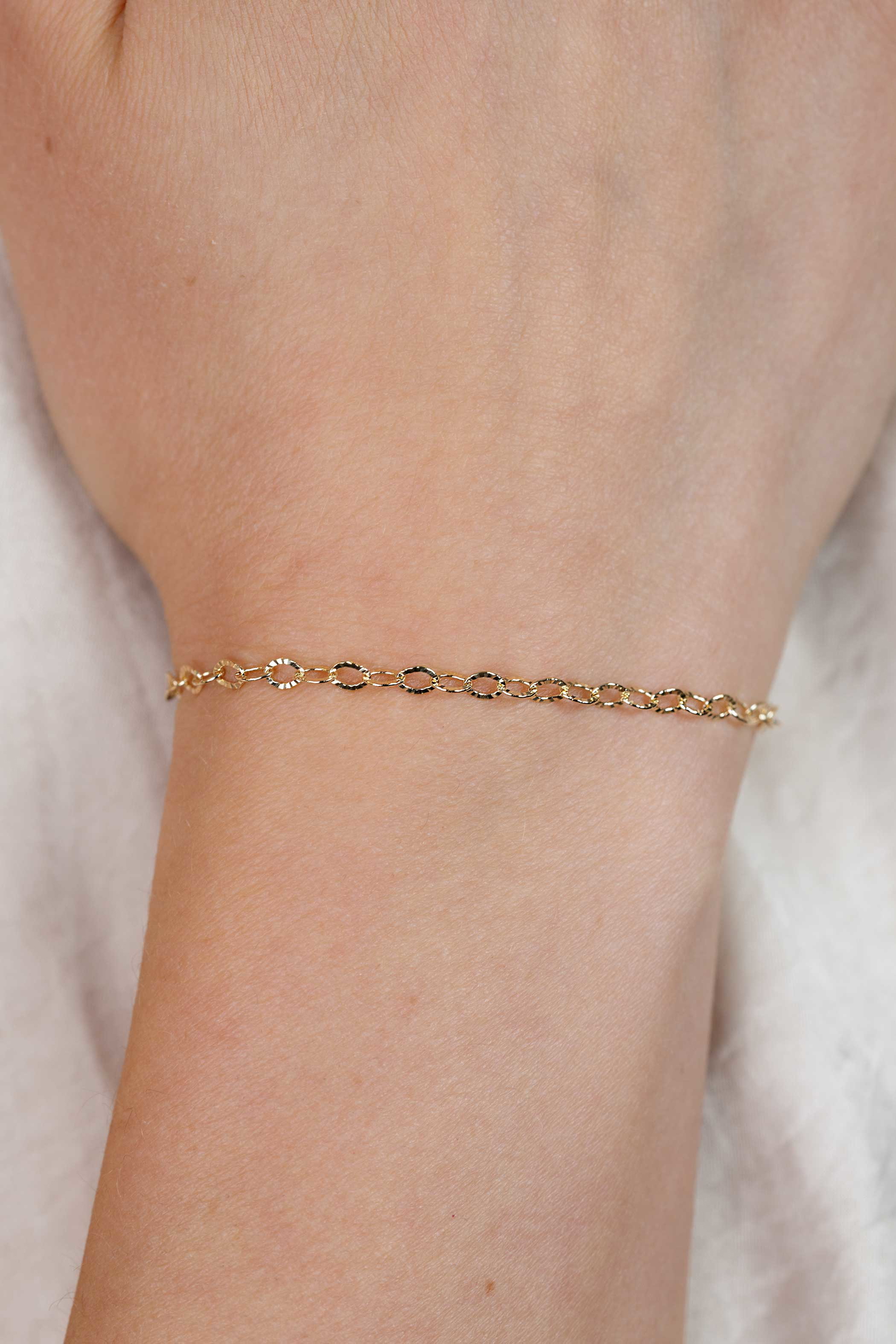 ZINZI Gold 14 krt gouden armband met bewerkte ovale schakels 3mm breed 19cm ZGA538