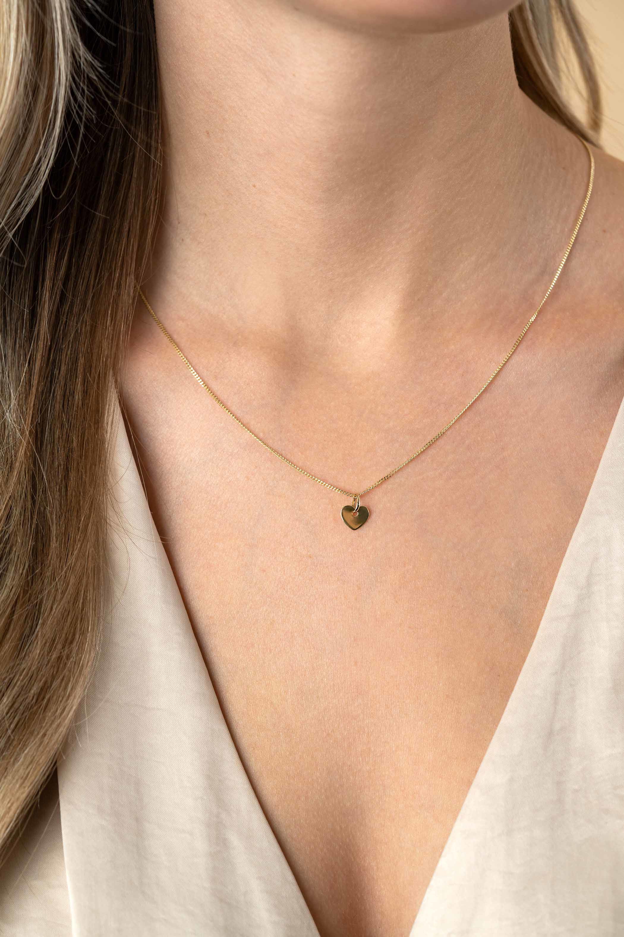 8mm ZINZI Gold 14 krt gouden hanger met trendy glanzend hartje van 8mm ZGH396-8 (zonder collier)