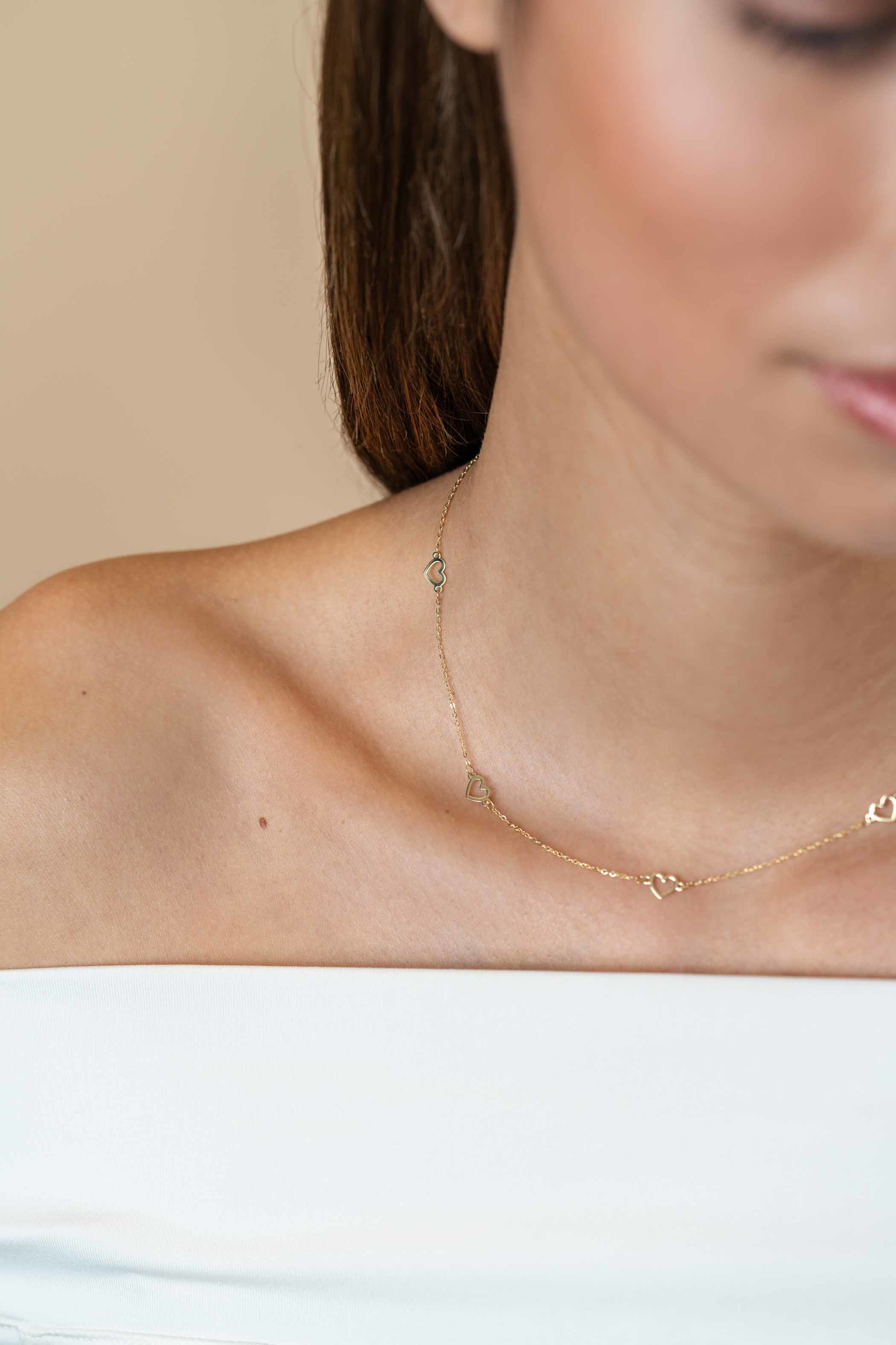 ZINZI Gold 14 krt gouden ketting met subtiele jasseron schakels en vijf open hartjes 5mm breed 42-45cm ZGC504
