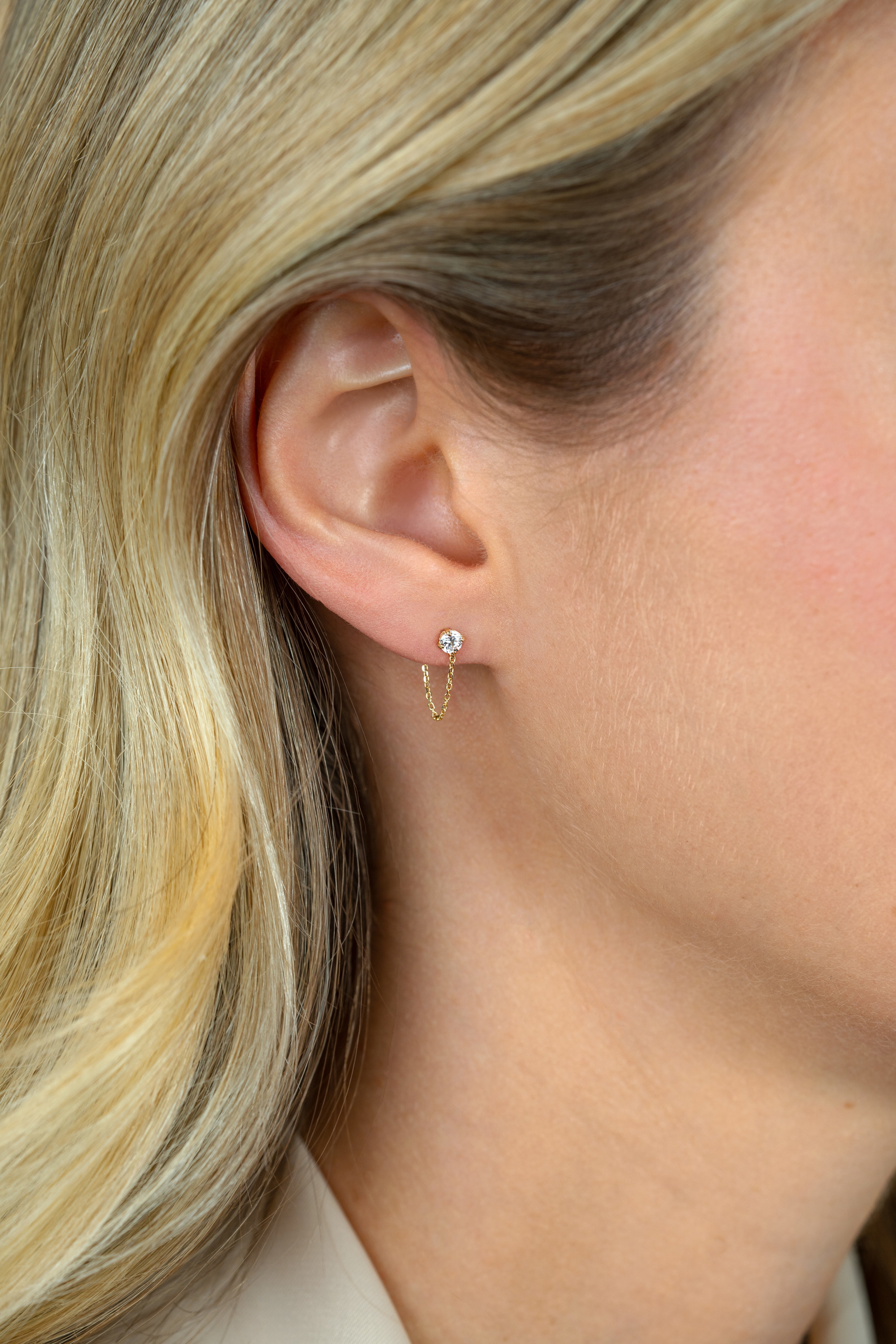 ZINZI GOLD oorknopjes zirc.met ketting naar pouss.