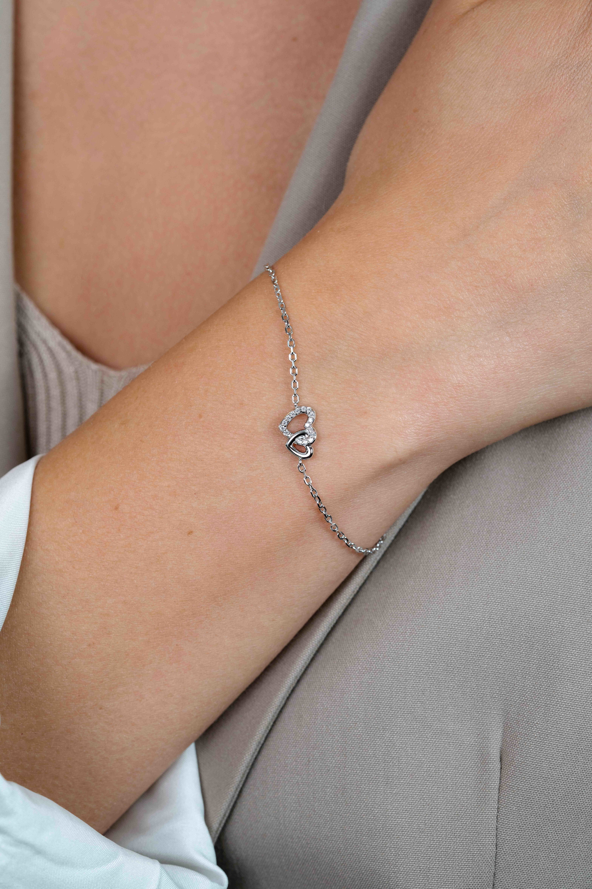 ZINZI zilveren armband met verbonden hartjes, witte zirkonia's 17-19cm ZIA2493