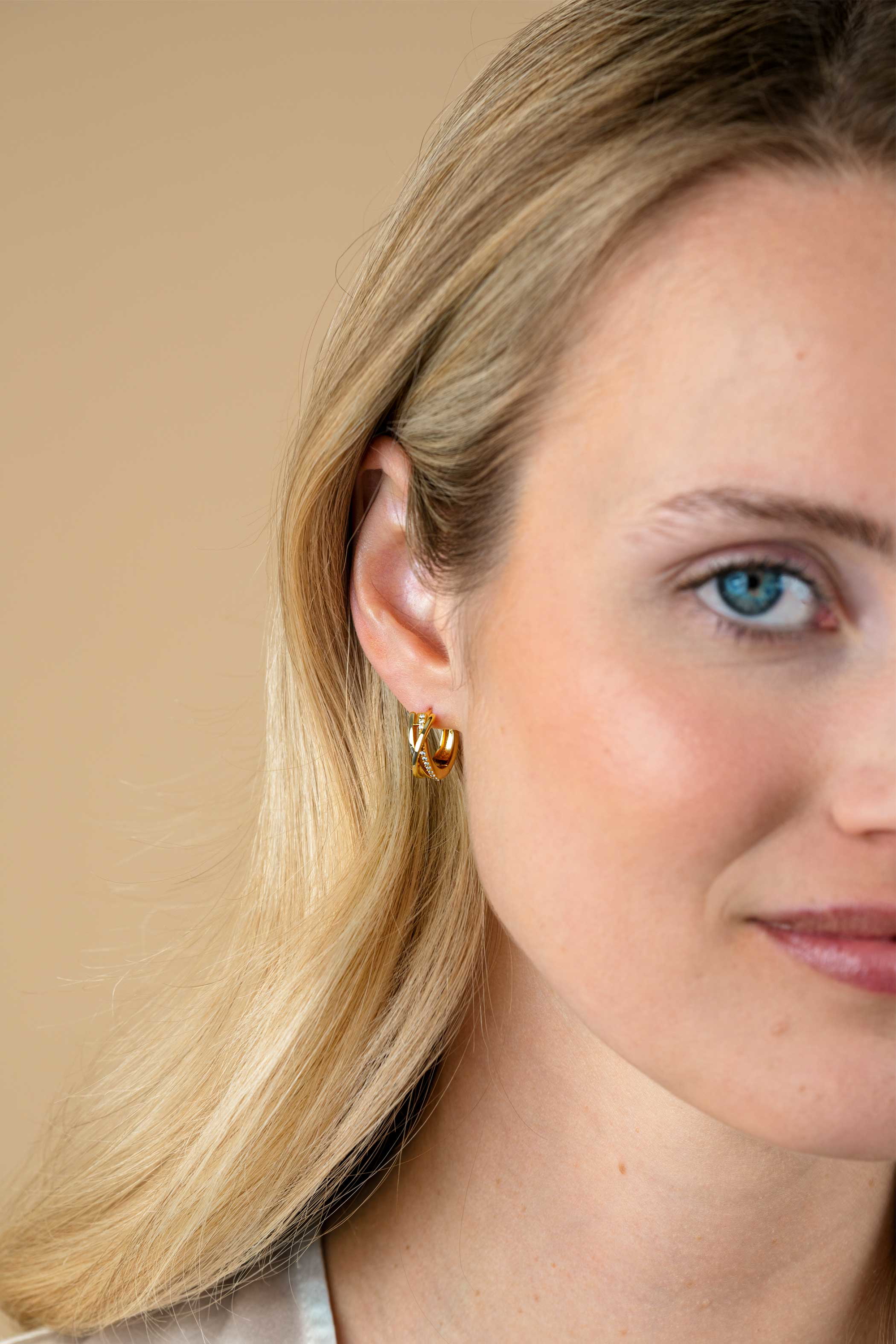 16mm ZINZI gold plated silver cross-over hoops 5.5mm wide set with white zirconia ZIO1774Y