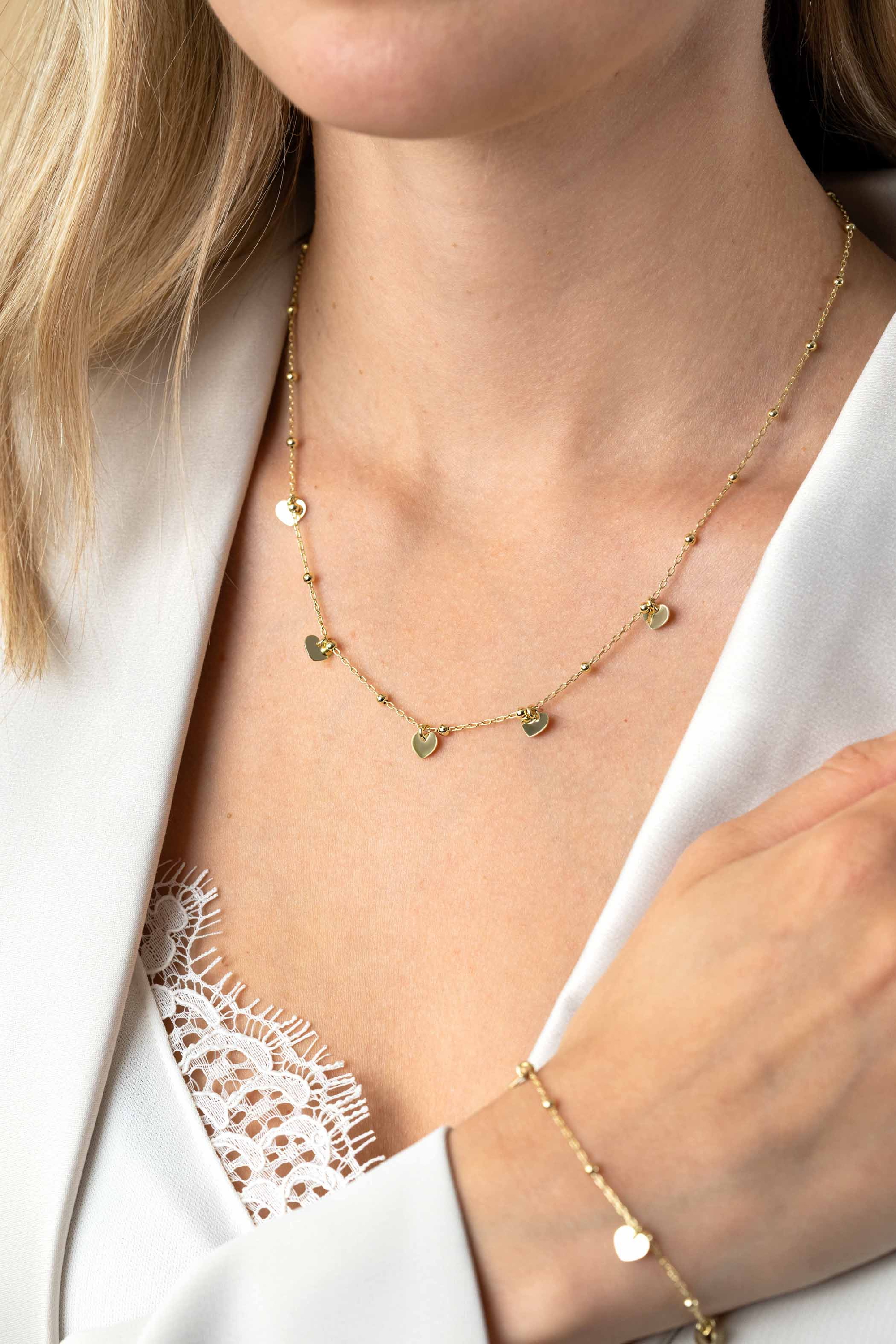 ZINZI zlv. collier gg.verg.fant. met hartjes eraan