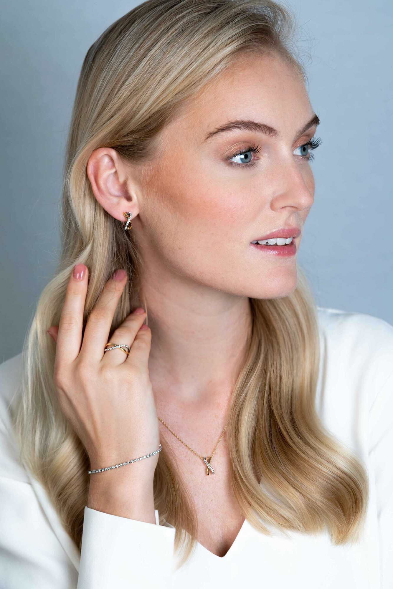 ZINZI Silberring Crossover bicolor besetzt mit weißen Zirkonia ZIR2234