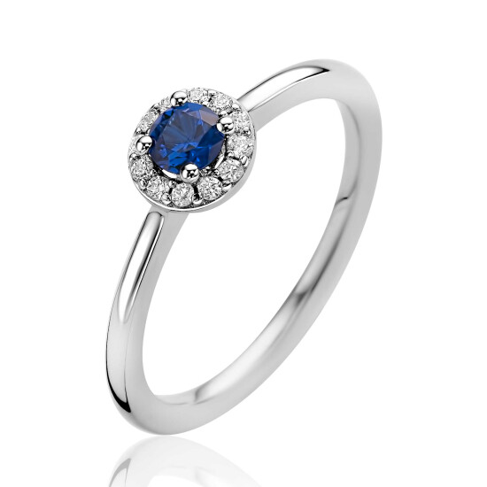 ZINZI zilveren entourage ring bezet met witte zirkonia's en saffierblauwe kleursteen ZIR2697B