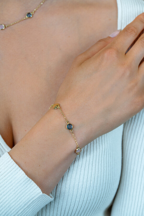 ZINZI zlv. armband gg.verg. blauw en roze kleursteen