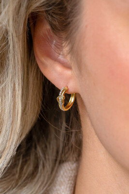 ZINZI zlv. oorringen gg.verg.golf met hart / zirconia's
